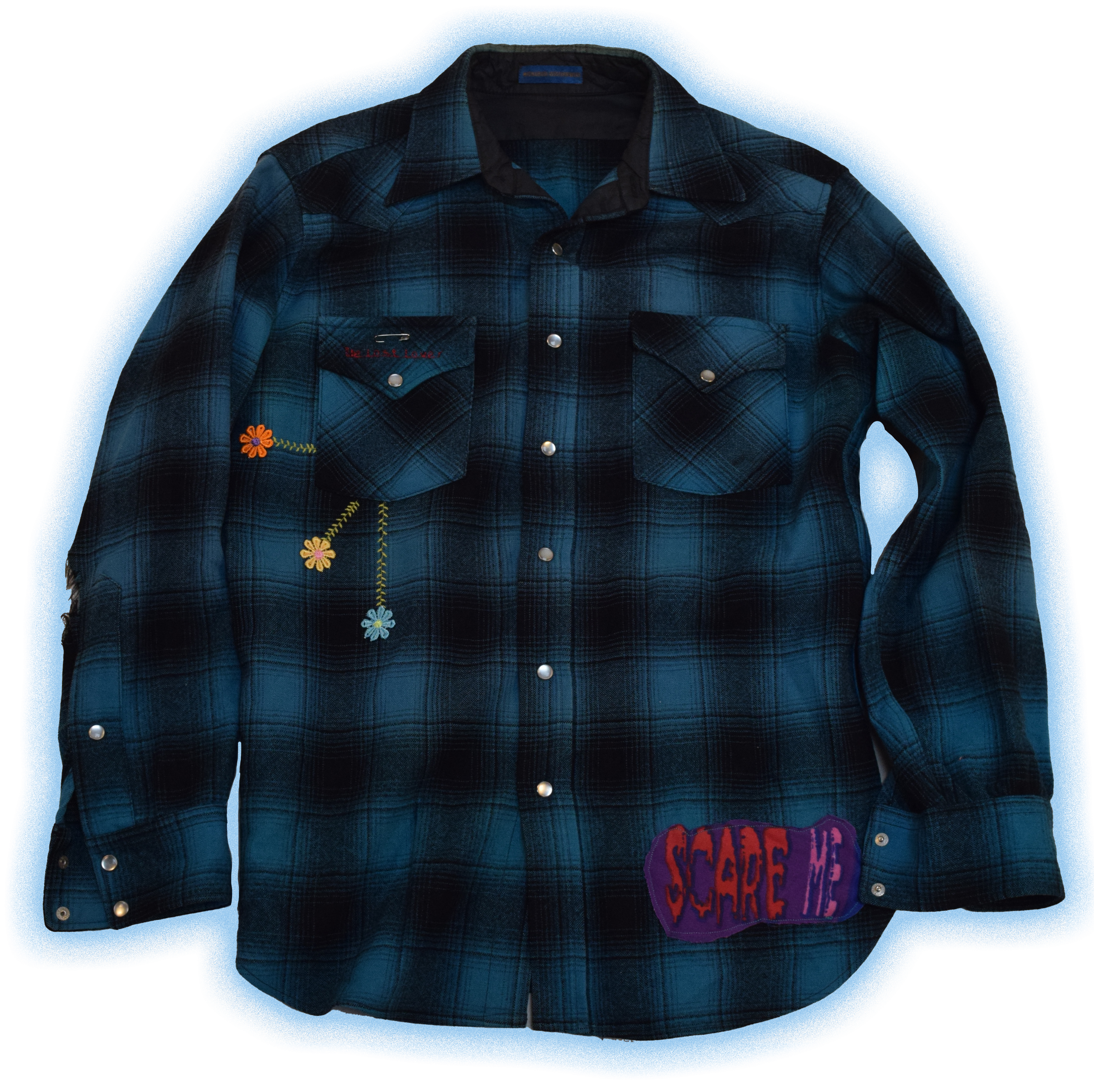 Blue plaid long-sleeve shirt with embroidery and patches, including a "SCARE ME" badge at the bottom right.