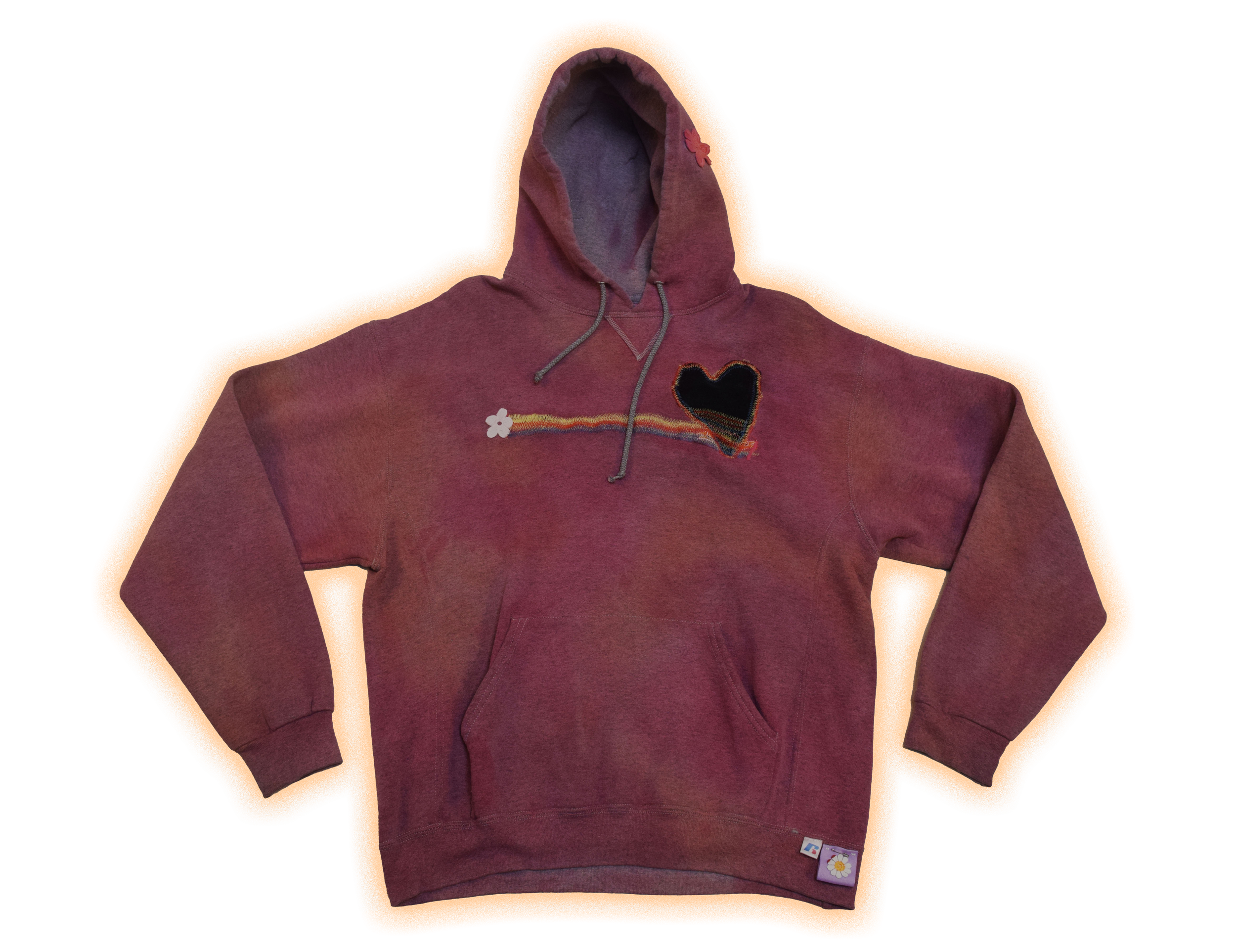 A maroon hoodie with a gray interior, featuring a black heart patch with a colorful embroidered border on the chest and a small white flower across a rainbow line.