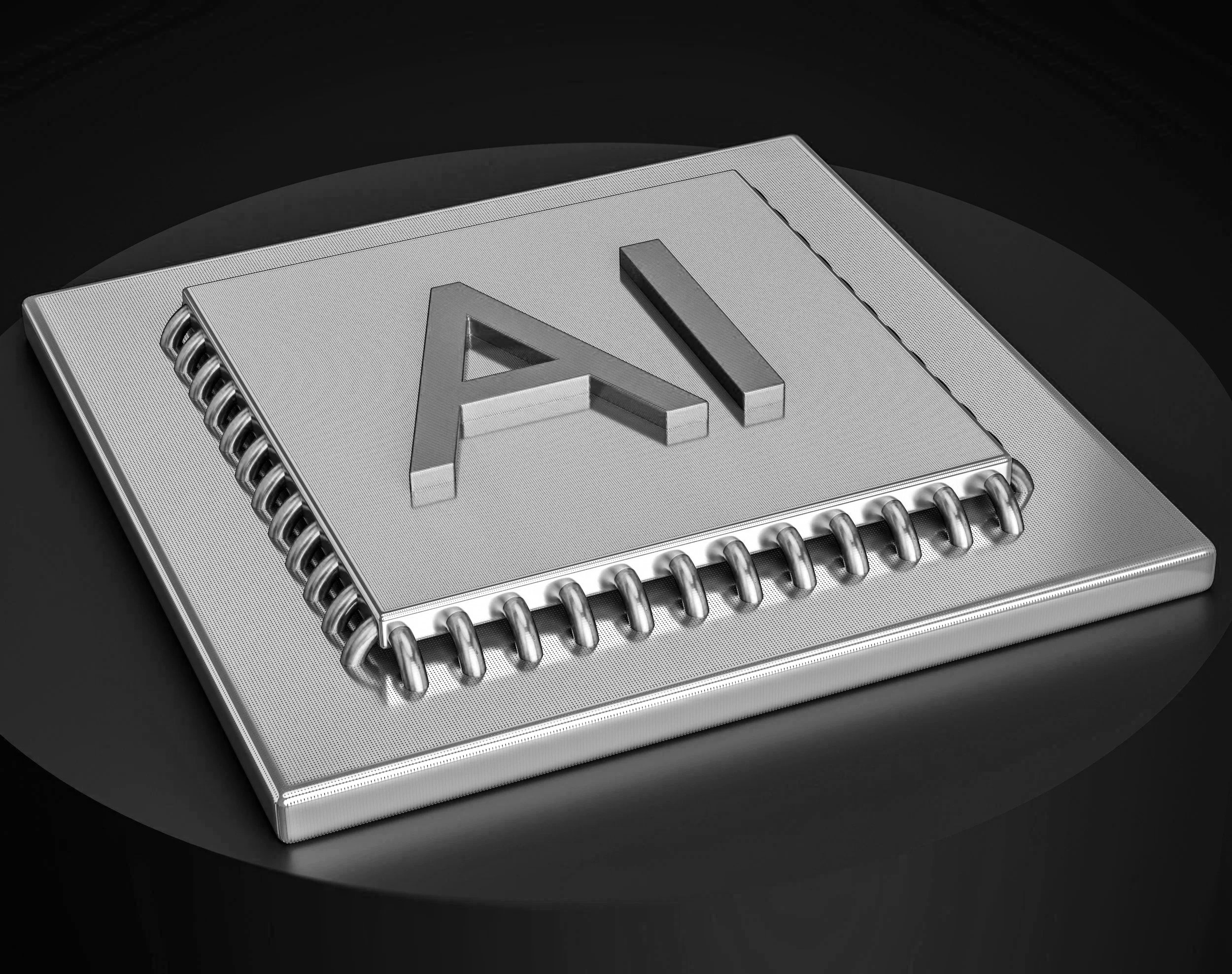 A metallic notebook with a raised letter 'A' on its cover, featuring a coiled binding on the left side, placed on a black surface.