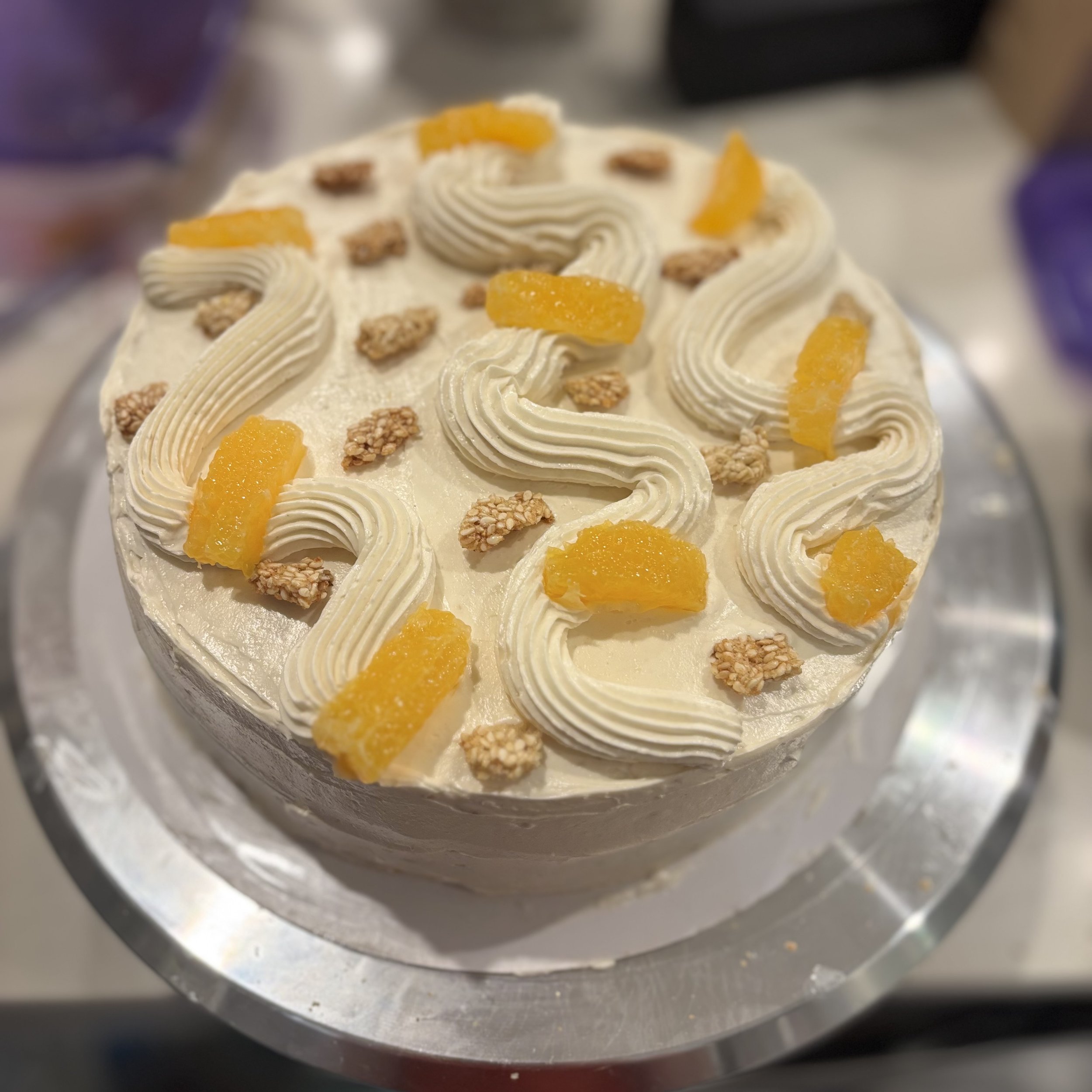 Sesame citrus chiffon cake with tahini Swiss meringue buttercream and sesame seed crunch
