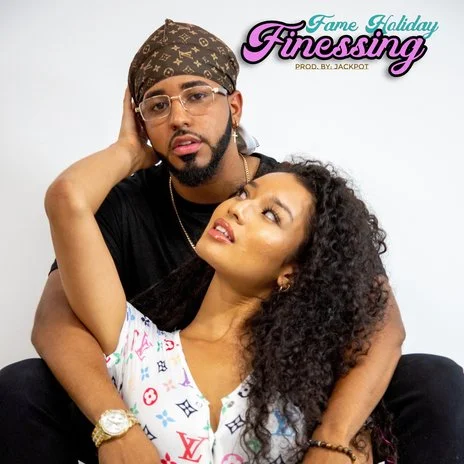 Fame Holiday with  woman looking up at him. The woman is wearing a white top with colorful patterns, and the man is wearing glasses, a patterned headscarf, and a dark T-shirt. Finessing Cover Art