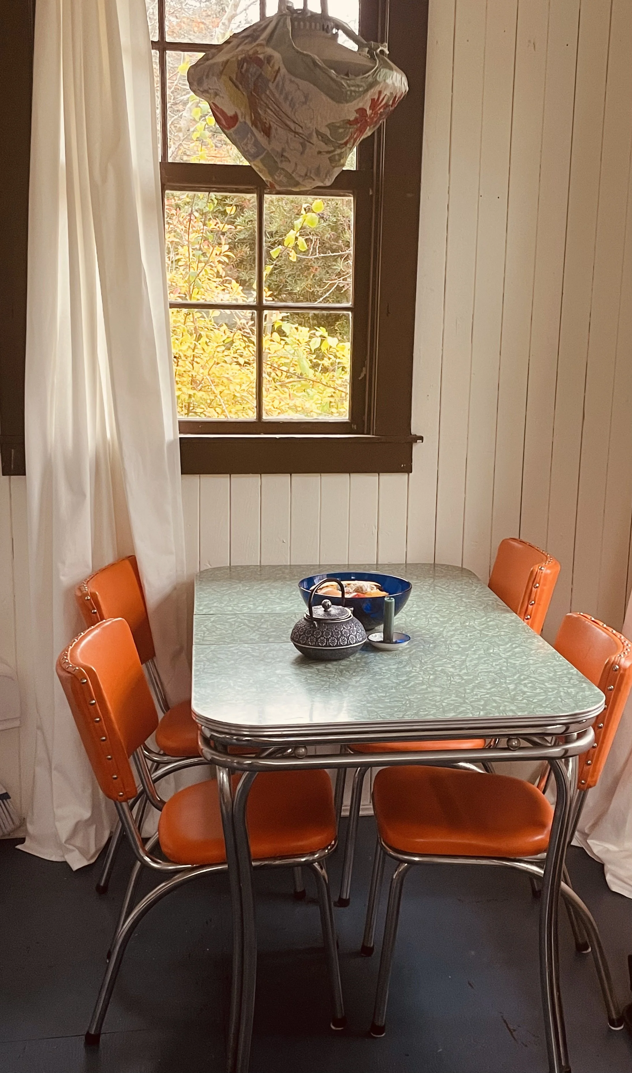 dining area near front window facing the ocean