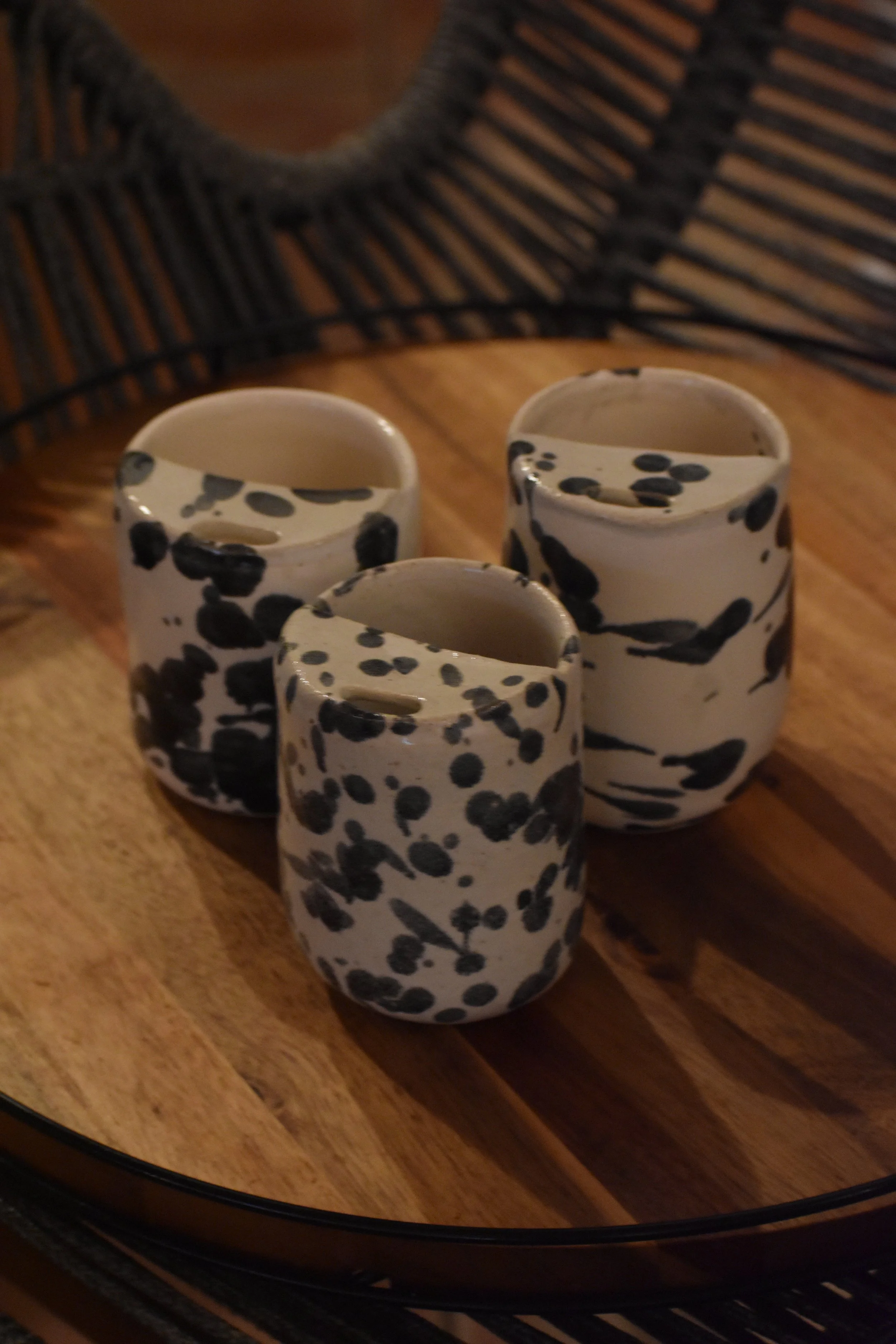 Speckled black and white traveling tumbler