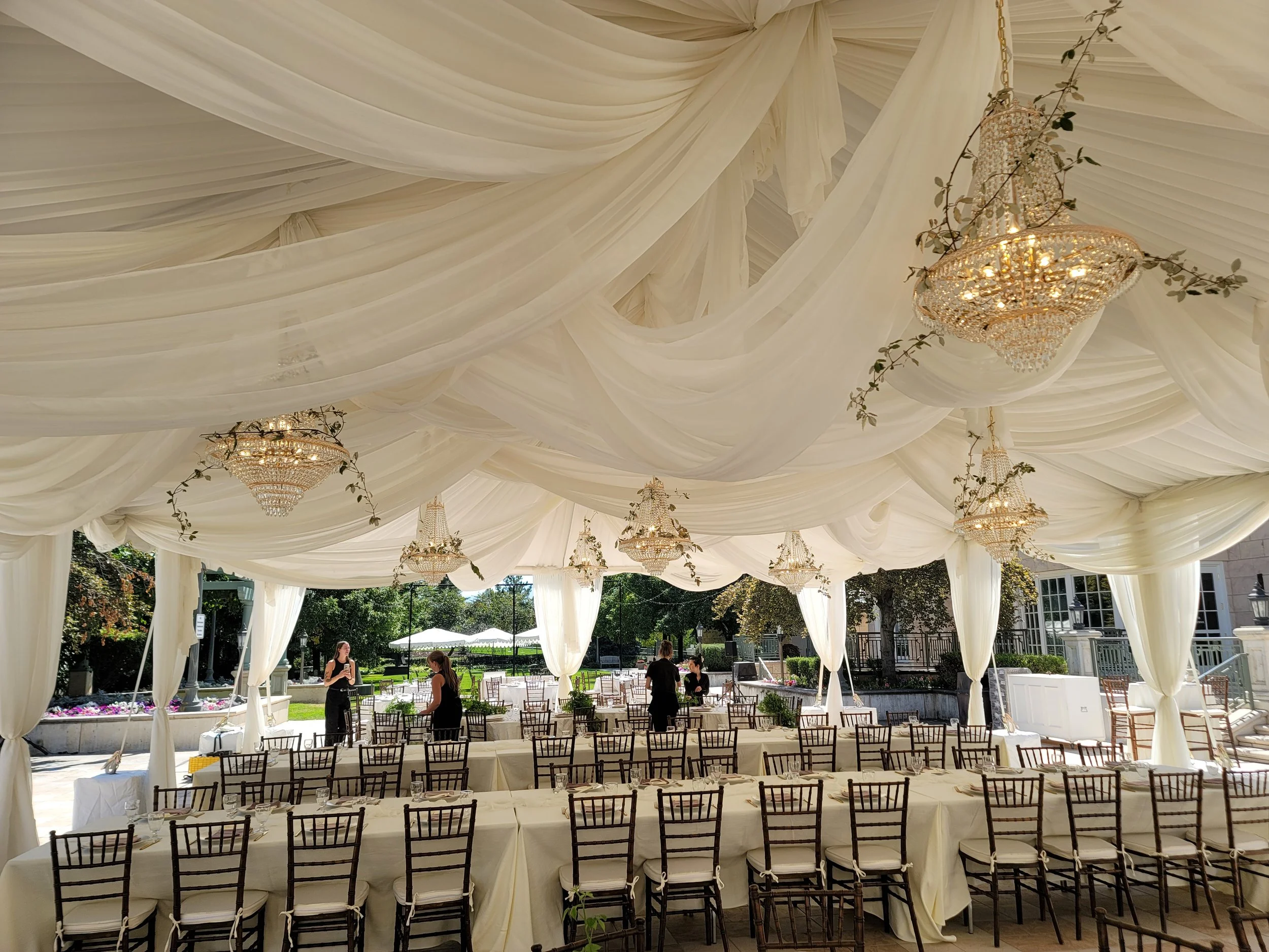 Abstract Fabric Draping with French Empire Chandeliers and Greenery