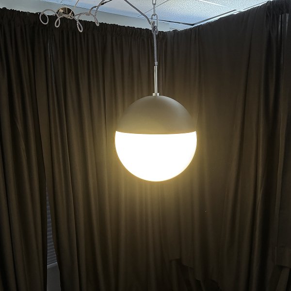 Black Hood White Ball - 18” x 13”