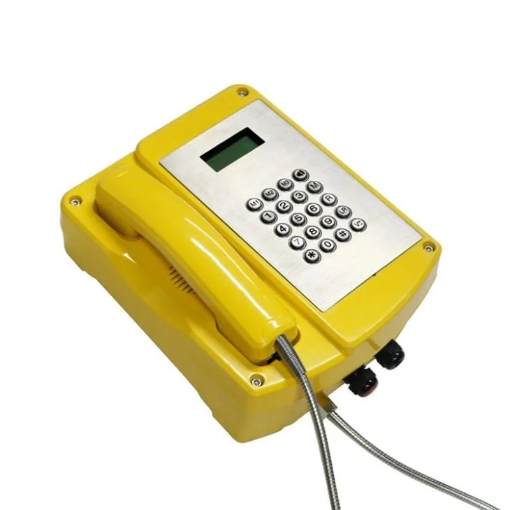 Yellow Explosion proof emergency telephone with a corded handset and a keypad, ideal for nuclear plants