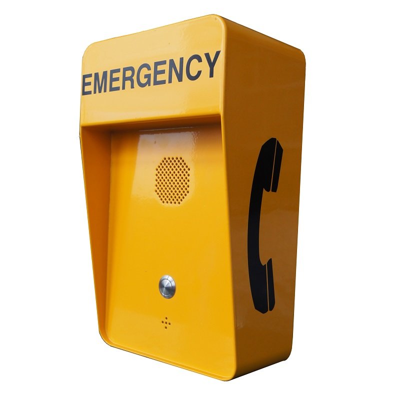 Yellow emergency telephone box with black phone icon on the side and the word 'EMERGENCY' at the top.