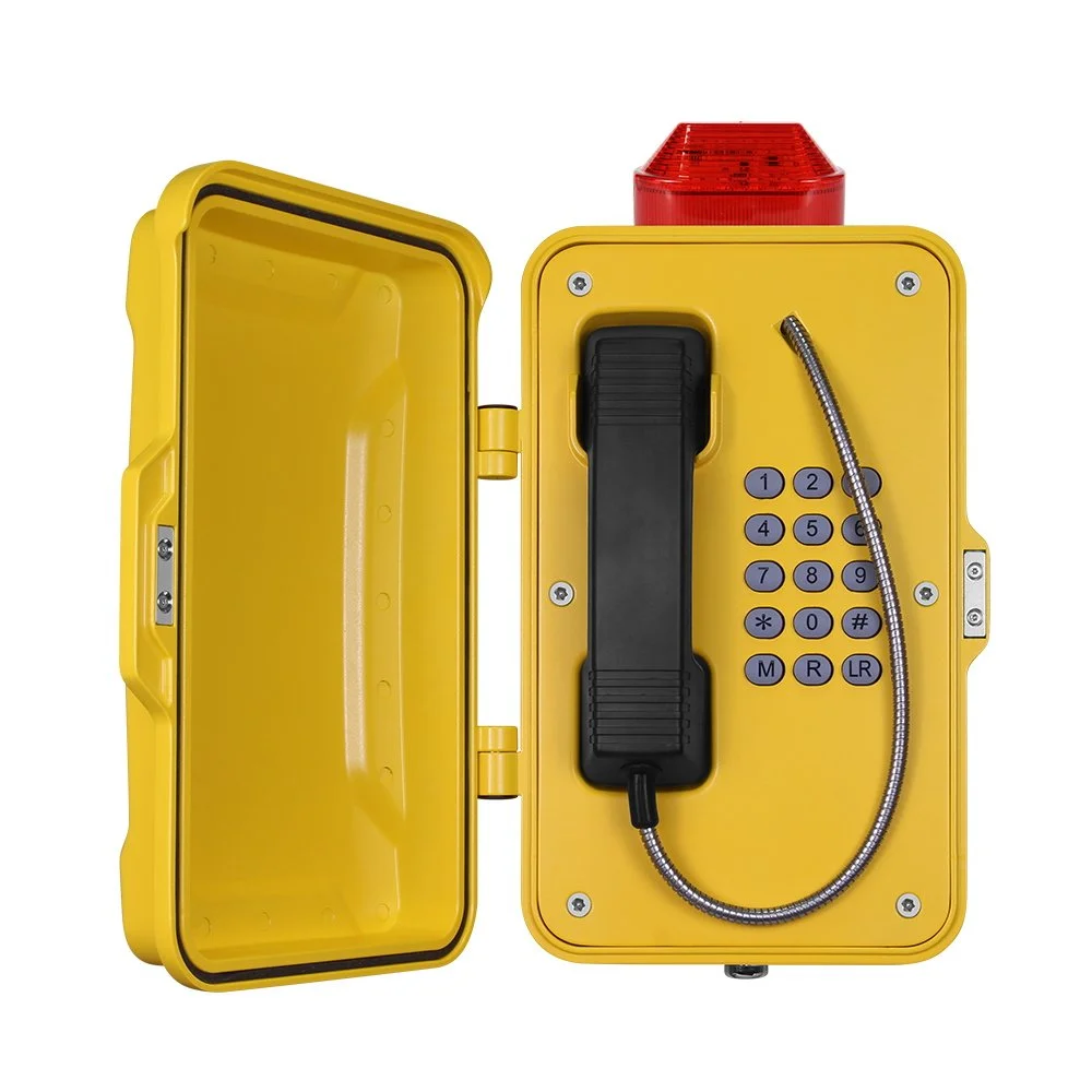 Yellow emergency phone with full keypad, black handset, and red warning light on top, in a yellow plastic case.
