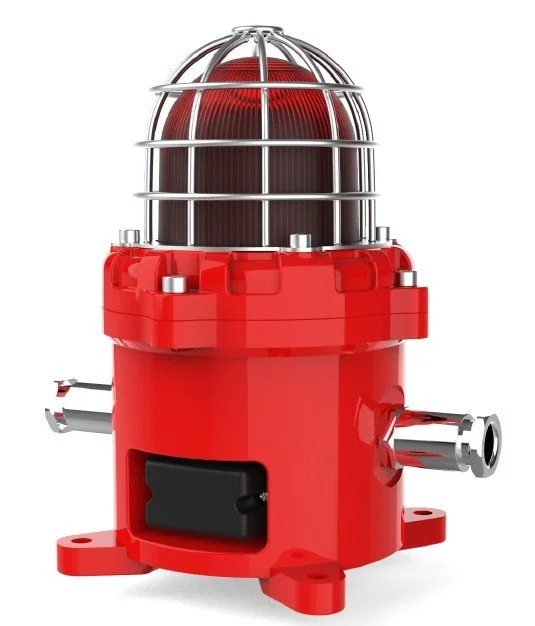 Red emergency alarm with a protective cage on top and metal connection ports on sides.