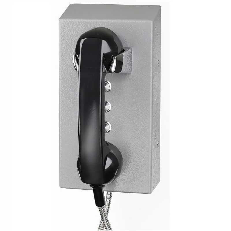 An industrial  wall-mounted black telephone with full keypad and a corded handset.