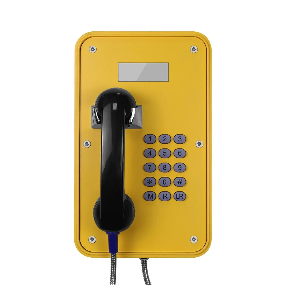 Yellow vandal proof emergency phone with black telephone handset, full keypad, and small LED display screen.