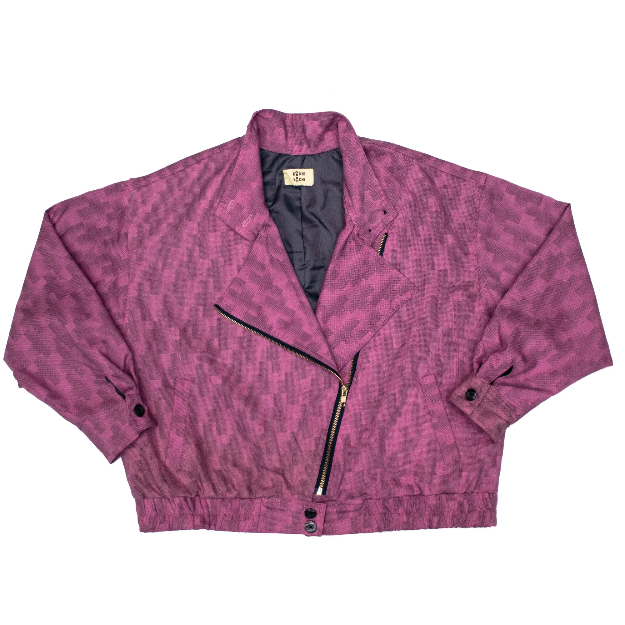 A pink patterned jacket with a zipper and buttons and a black inner lining.