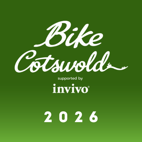 Green background with white text that reads "Bike Cotswold 2026" in a stylized font, with a small bicycle graphic integrated into the text.