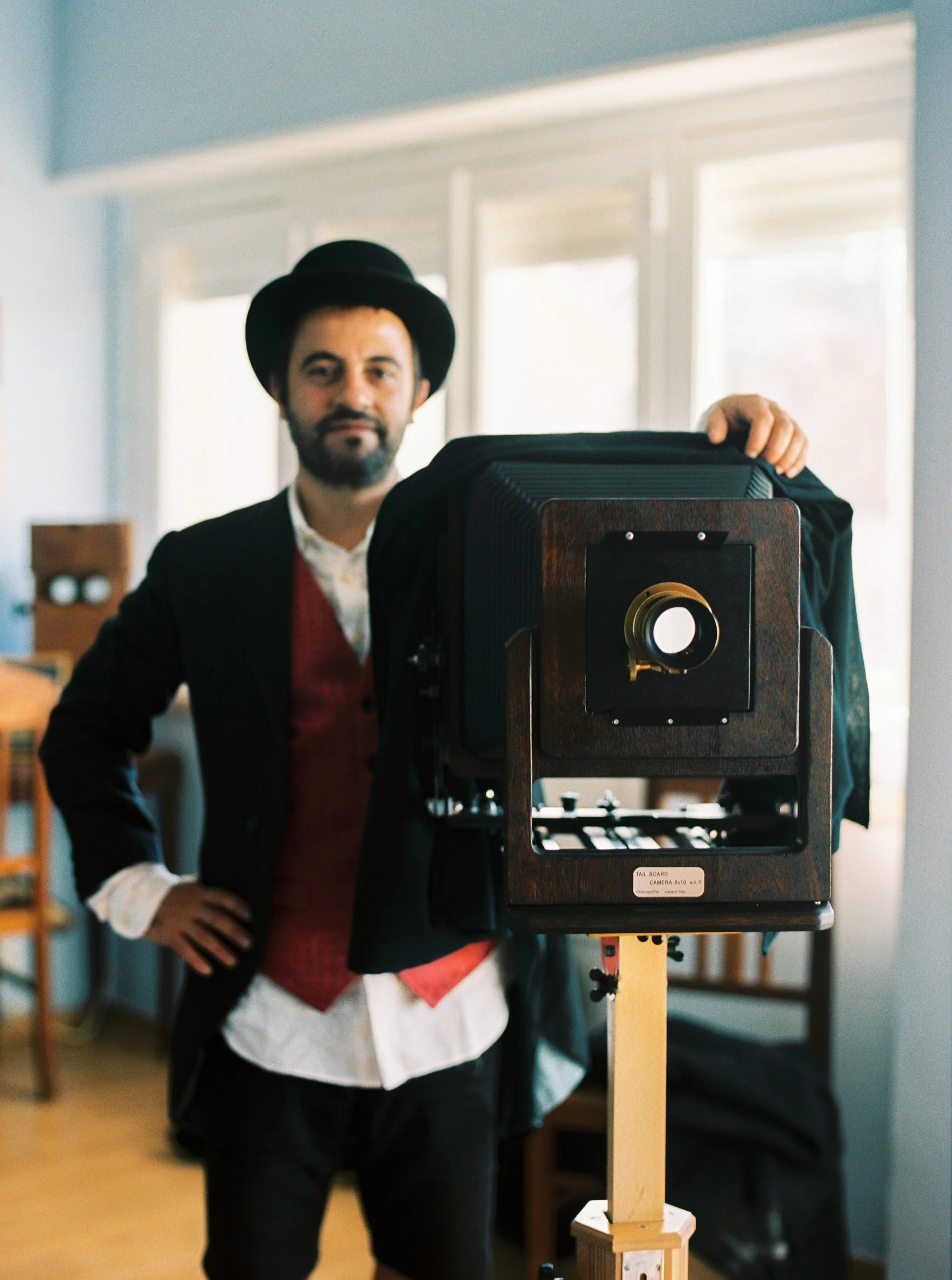 Filipe setting up a large-format camera for a wet plate collodion session at Five Studio in Sintra