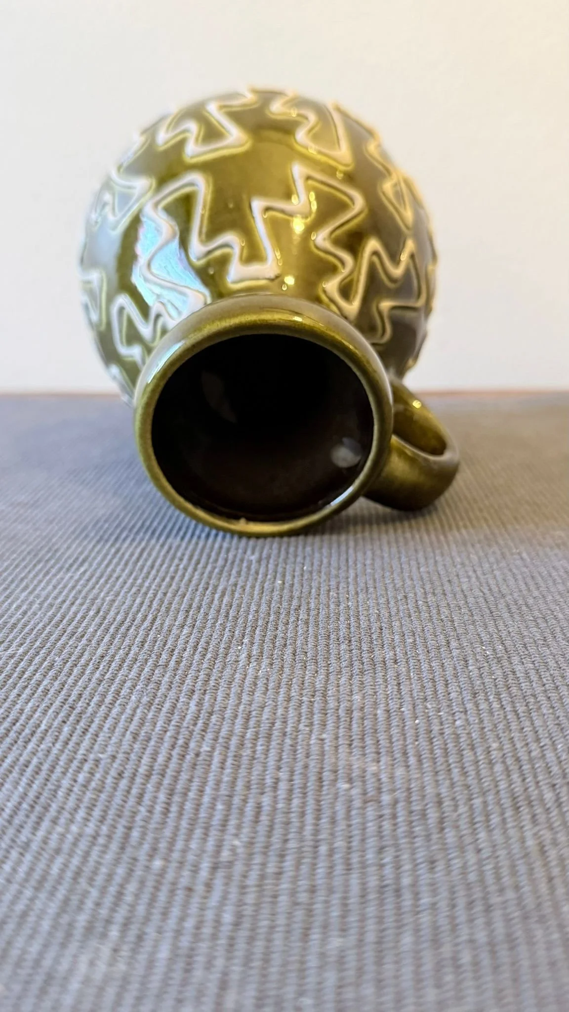 Small green puzzle vase top.jpeg