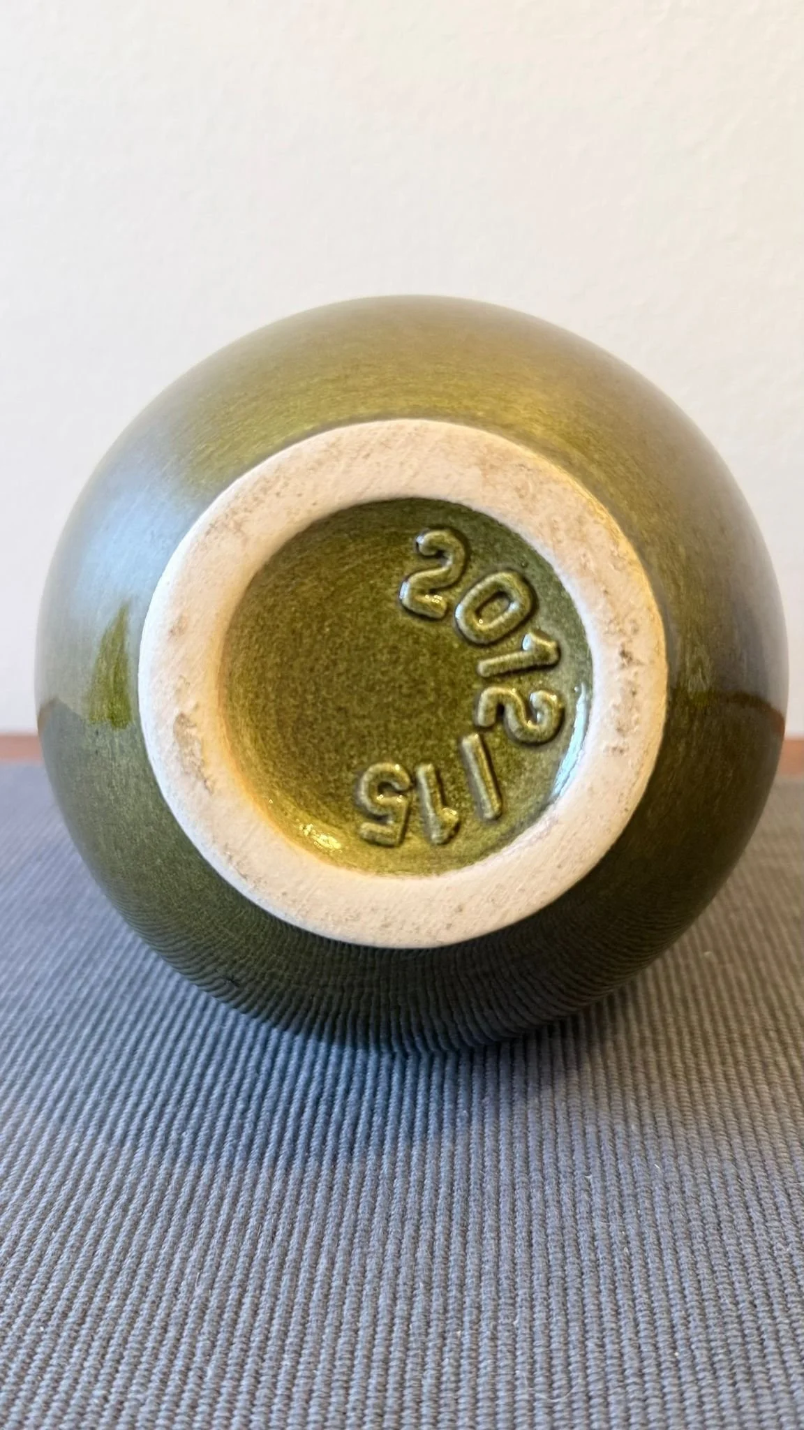 Small green puzzle vase base.jpeg