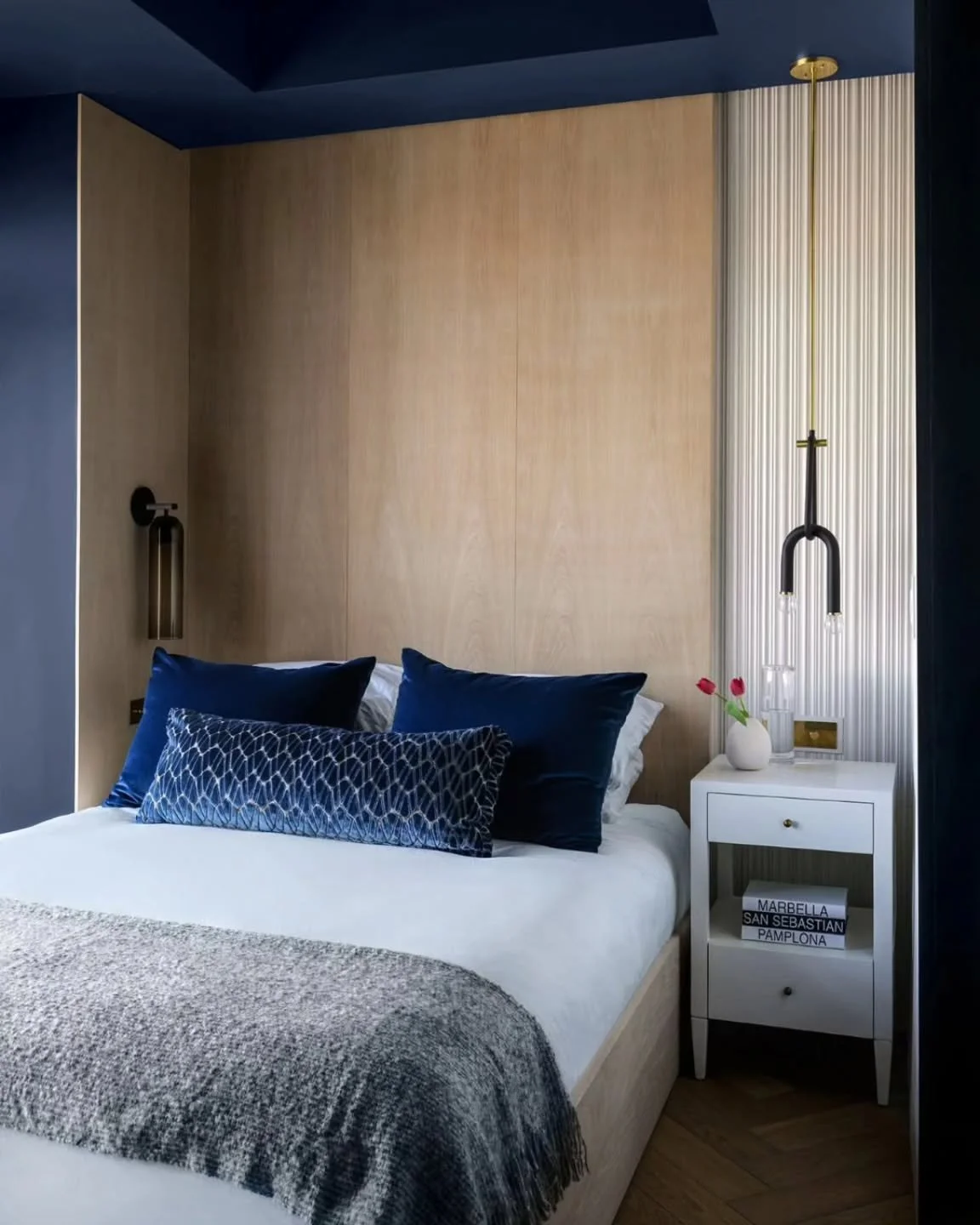 Sharing this handsome bedroom suite by @blanchegarcia

A guest room designed to rival any European hotel stay.✨

We enveloped this Weehawken townhouse suite in rich navy tones with charcoal undertones, perfectly framing its waterfront view. 

The cus
