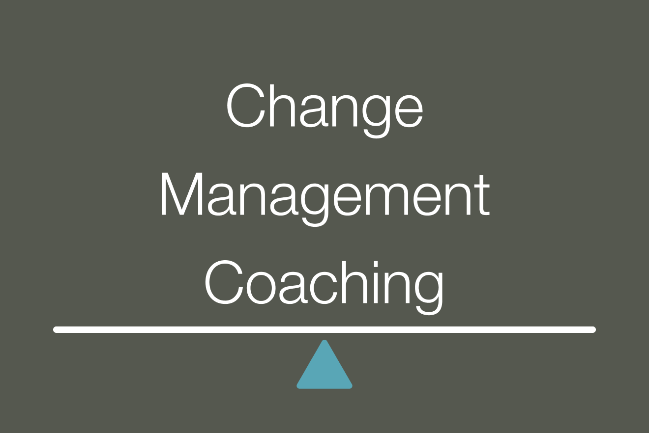 Text reading 'Change Management Coaching' on a dark gray background with a blue triangle under the text.