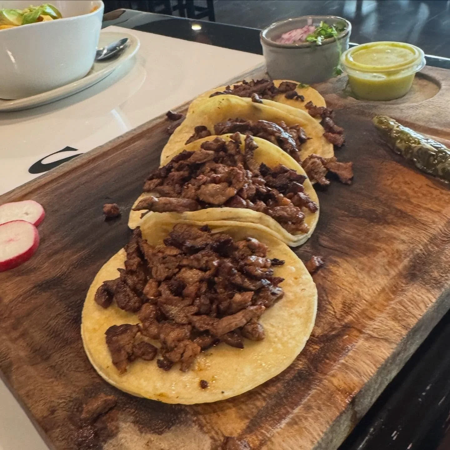 Beep, beep! Make room for the giant a** cutting board block of street tacos. Found this surprising gem of a presentation at Tekilas on 2nd street in the Rog. #stadiumnachos #streettacos