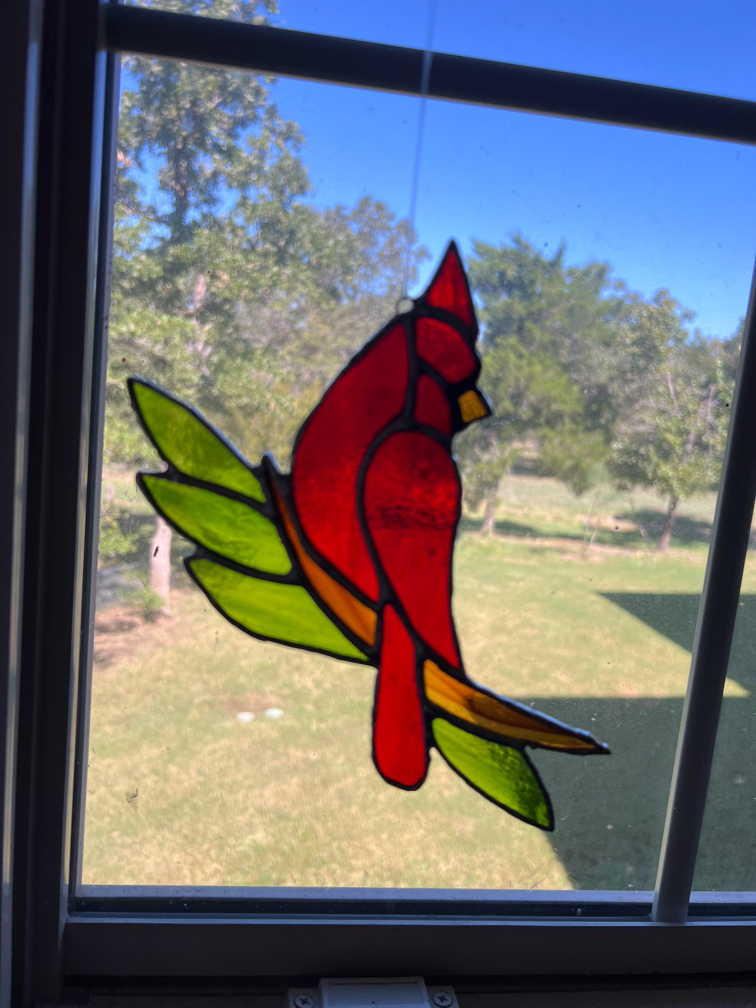 "Pecker Tech" is a cardinal done for a retired Lamar University professor. When I was growing up in the late '50s and early
'60s, students from rival schools claimed the school's mascot cardinal looked more like a woodpecker, hence Pecker Tech.