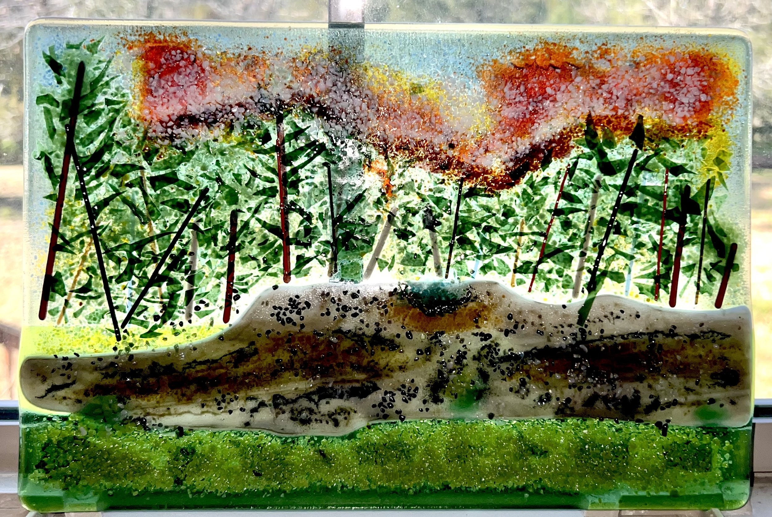4MRock is my first piece using frit painting. Mediocre though it is in my eyes, it was a great learning experience. In real life the rock is in the front yard of some friends in New Hampshire. It covers around 1600 sq ft, about the footprint of a