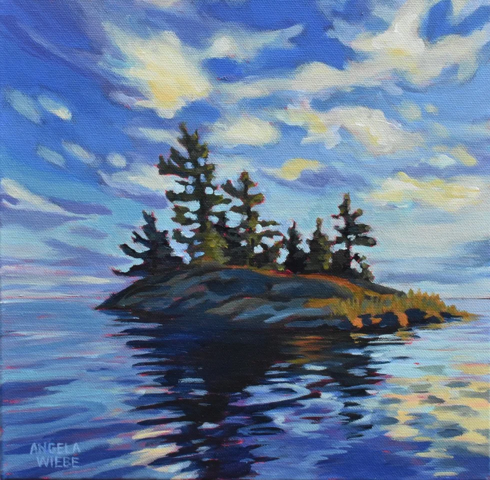 Quiet Reflection, a painting by Angela Wiebe of a small rock island with trees in a lake as the sky begins to turn purple at dusk