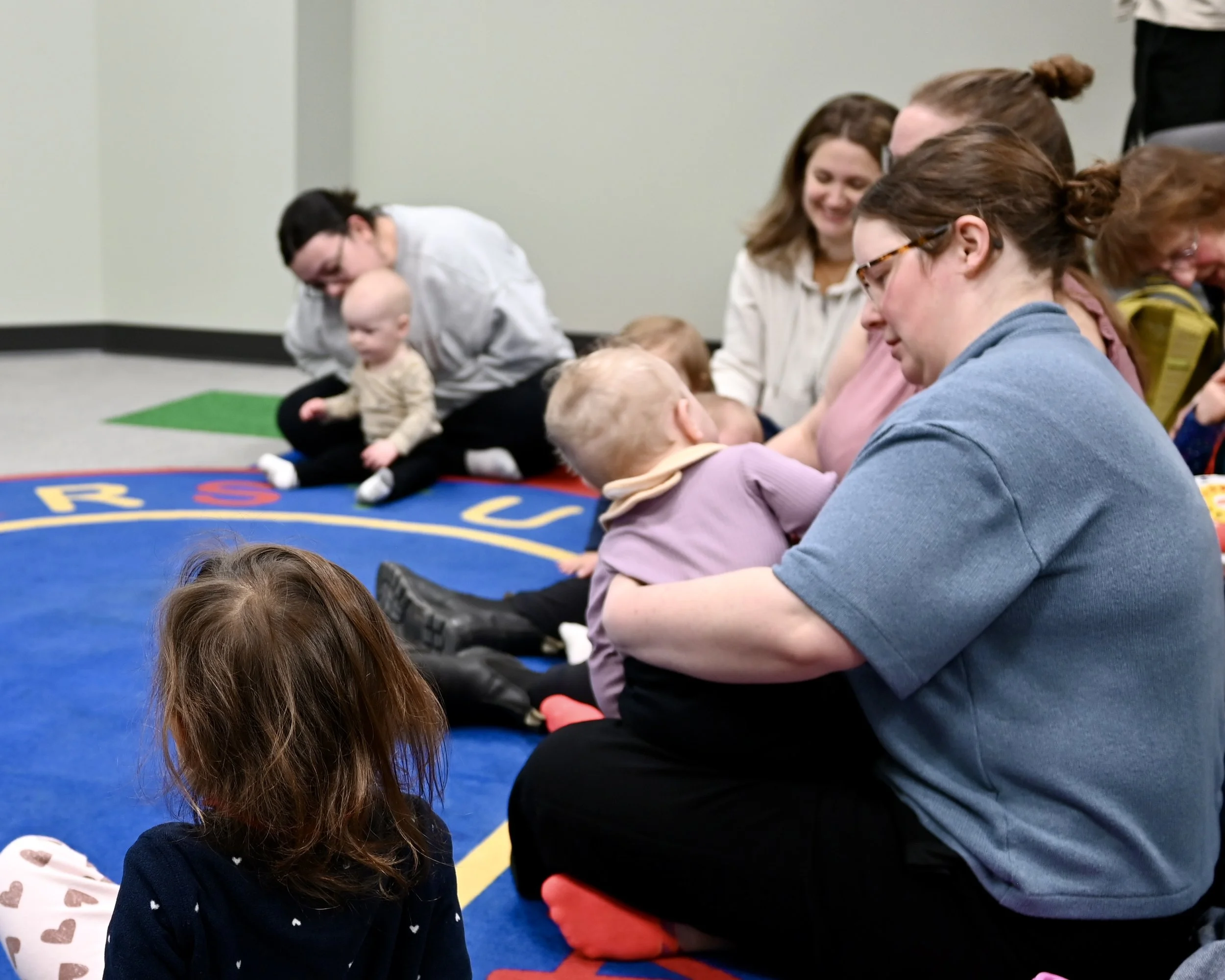 Families gathered in the new programming room at County Park Library