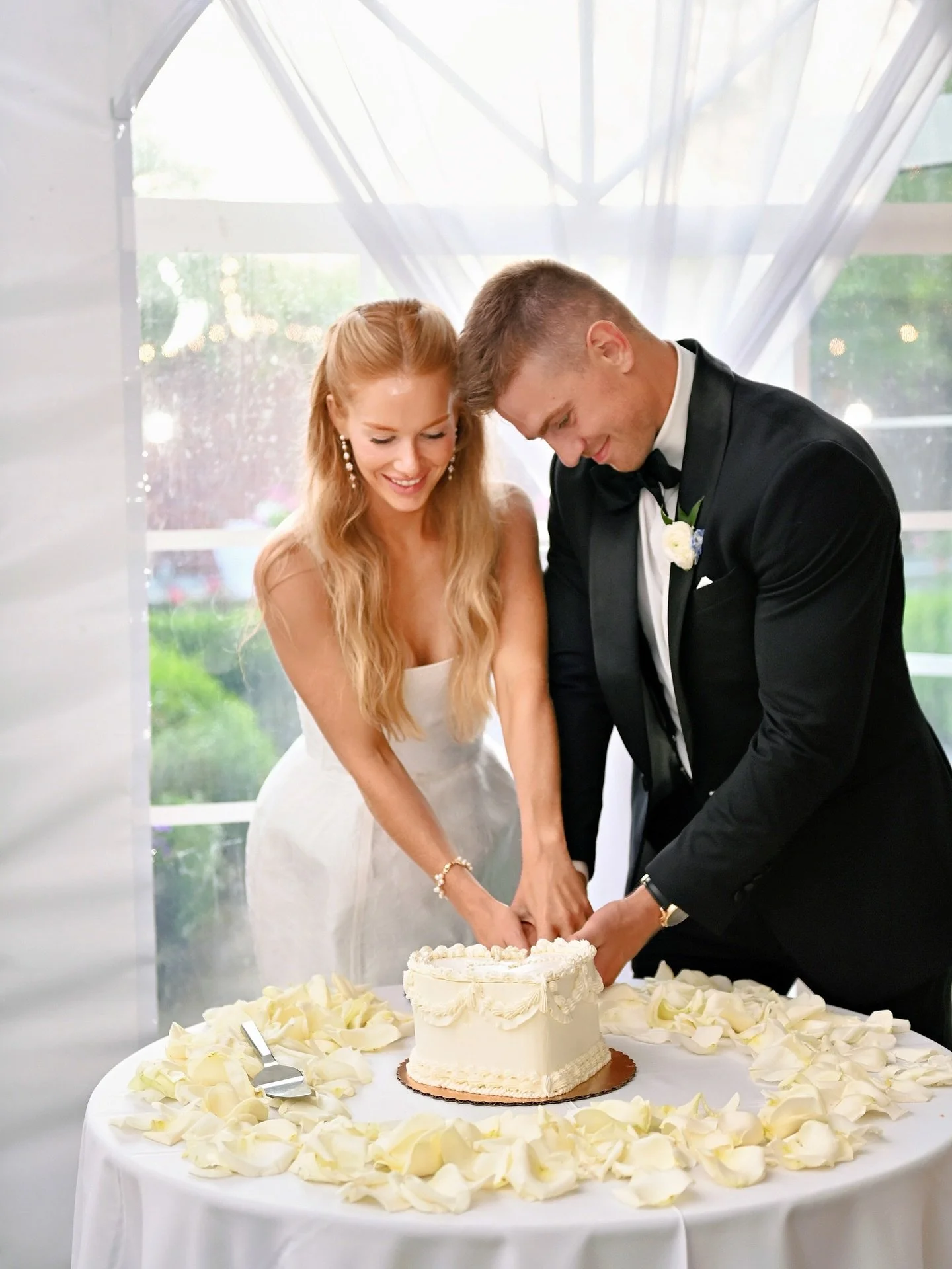 ✨ Love, laughter, and ocean views &mdash; Erin &amp; Jim tied the knot on July 13th, 2025 at the breathtaking @misselwoodevents, and every moment was pure magic. From the stunning florals to the iconic cake-cutting, their day was a dream come true 💍