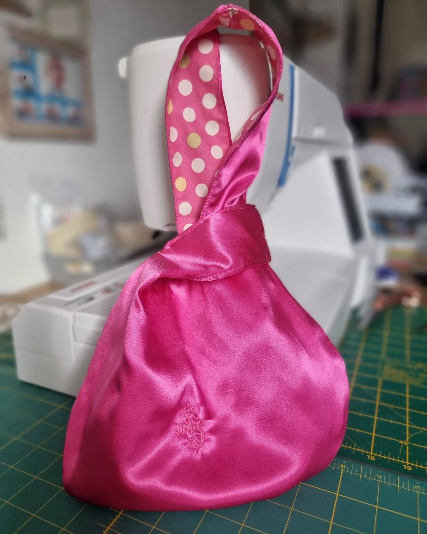 Waste fabric turned into a bag! Another sample here for you to see, feel, try out. 

Here's the Japanese knot bag. This was made from a bridesmaids waste shawl wrap that sometimes is given to a bridesmaid oufit but not actually needed or wanted to us