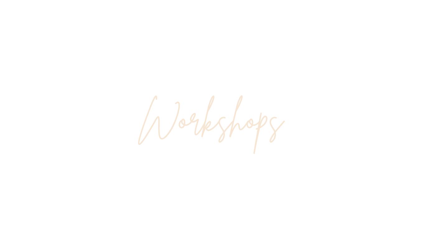 Black background with the words 'Workshops' written in cursive style in the center.
