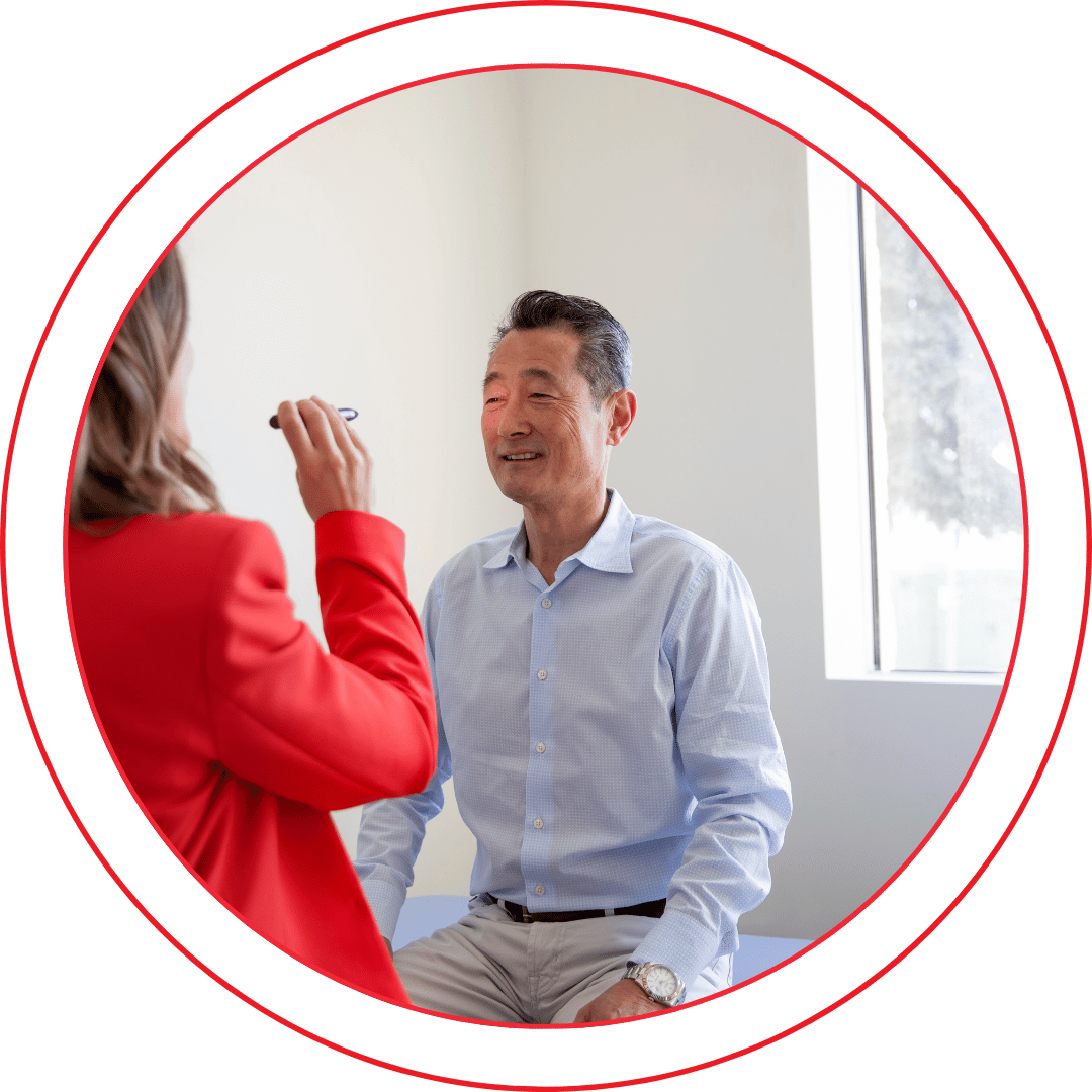 Dr. Rachel Assessing for Vestibular Issues on a male patient