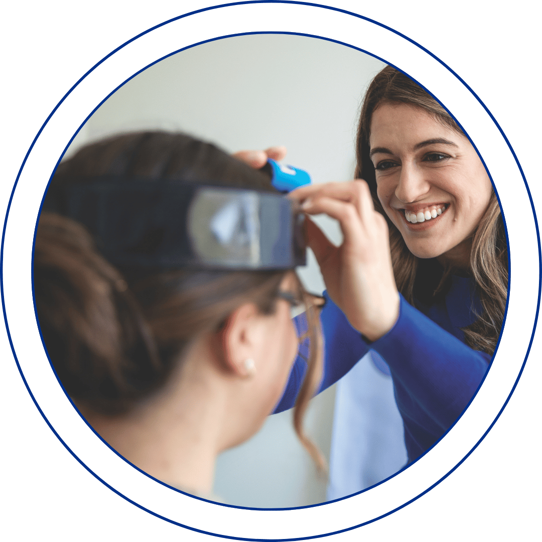 Dr. Rachel Adjusting a head laser on a patient to assess the patient neurological capacities
