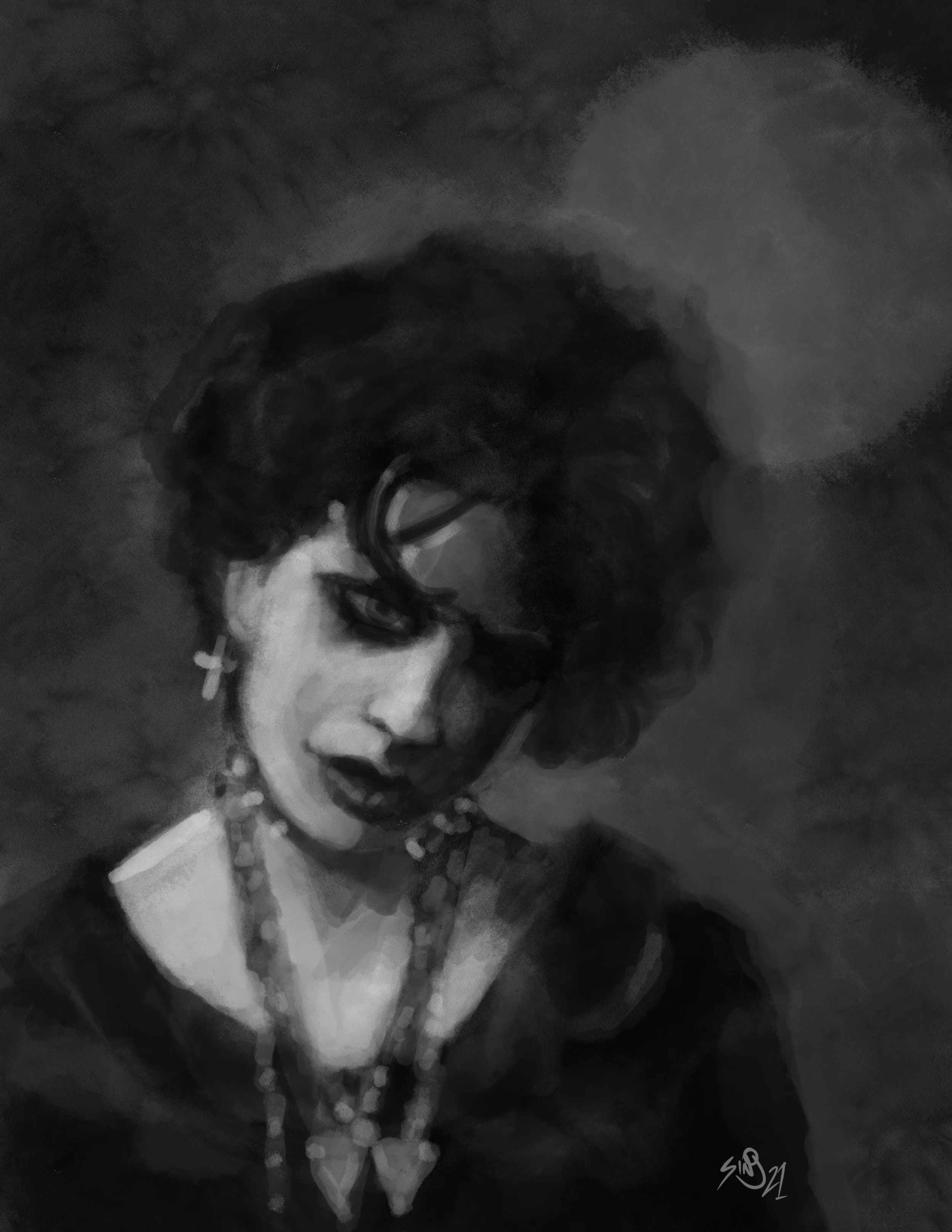 Black and white portrait of a woman with dark curly hair, dark eye makeup, and lipstick, wearing cross earrings, necklaces, and a dark top, with a moody background.