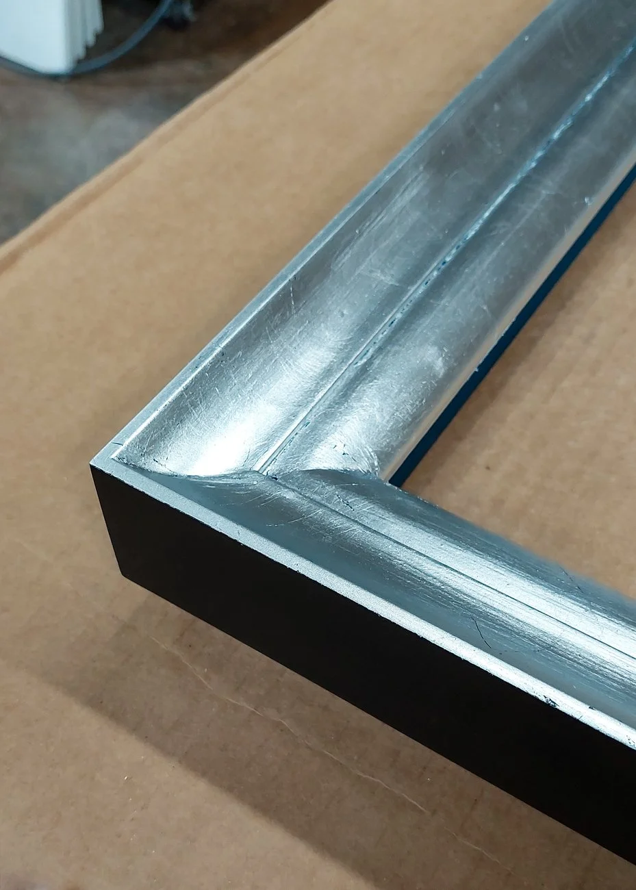 Silver leafed frame with traditional profile