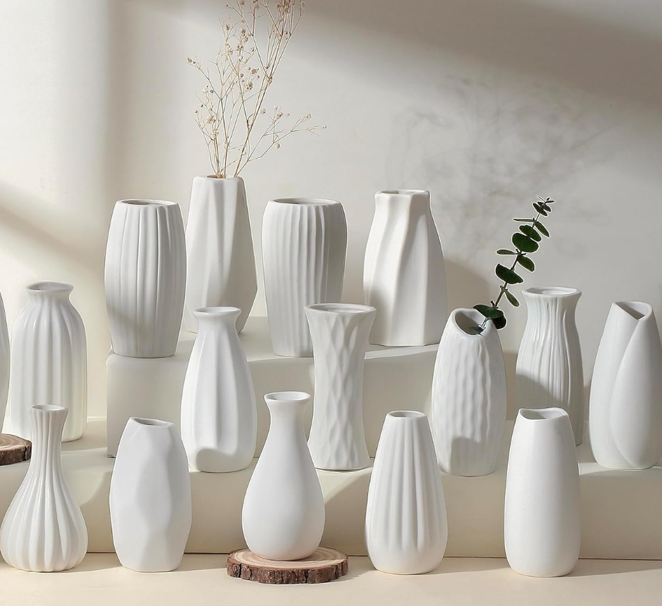 Matte white mismatch accent vases$1.25 each
-16 available 