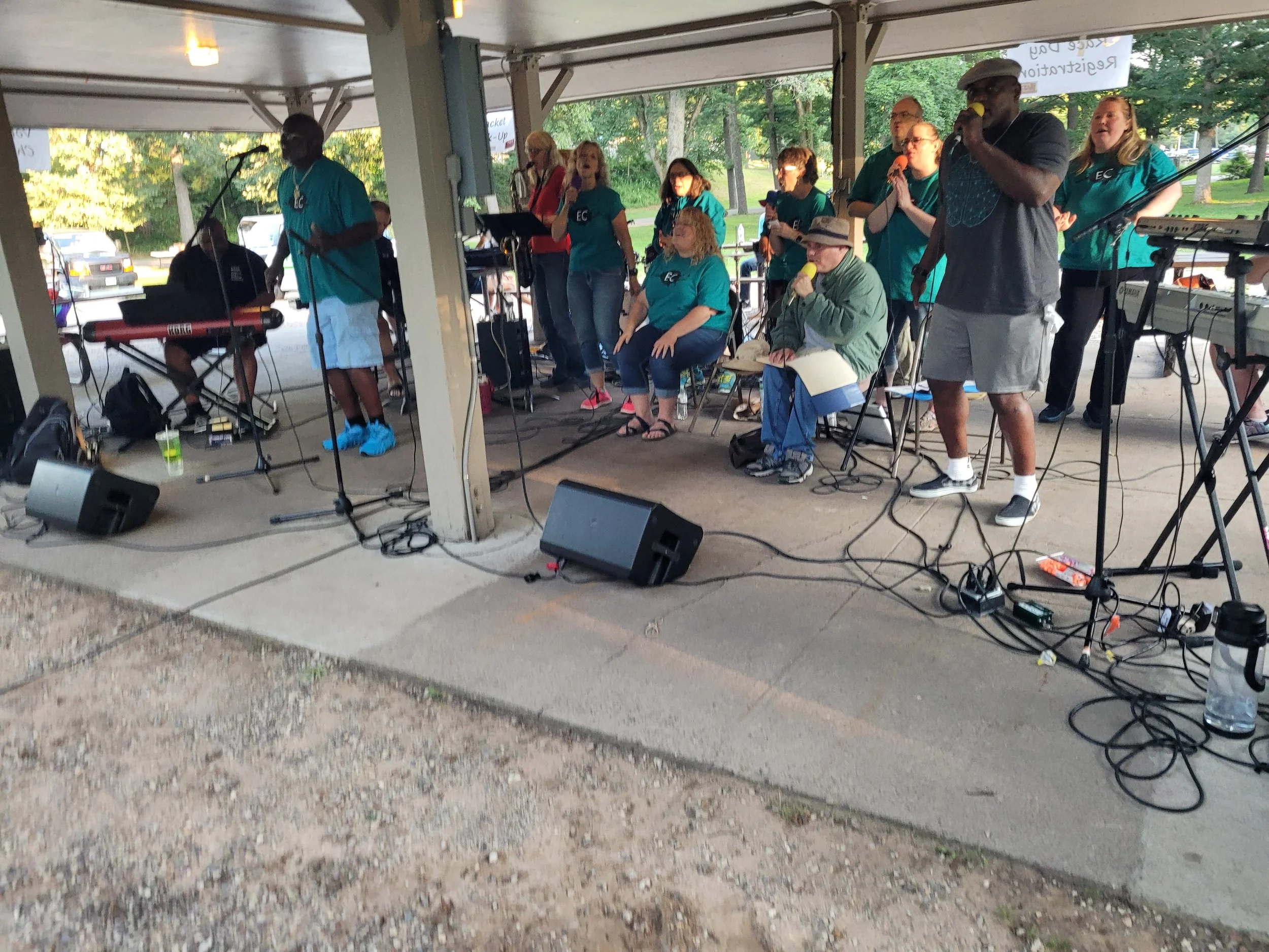 Collective choir singing in eau claire wisconsin at carson park gospel and hip hop music all ages community Jesus original