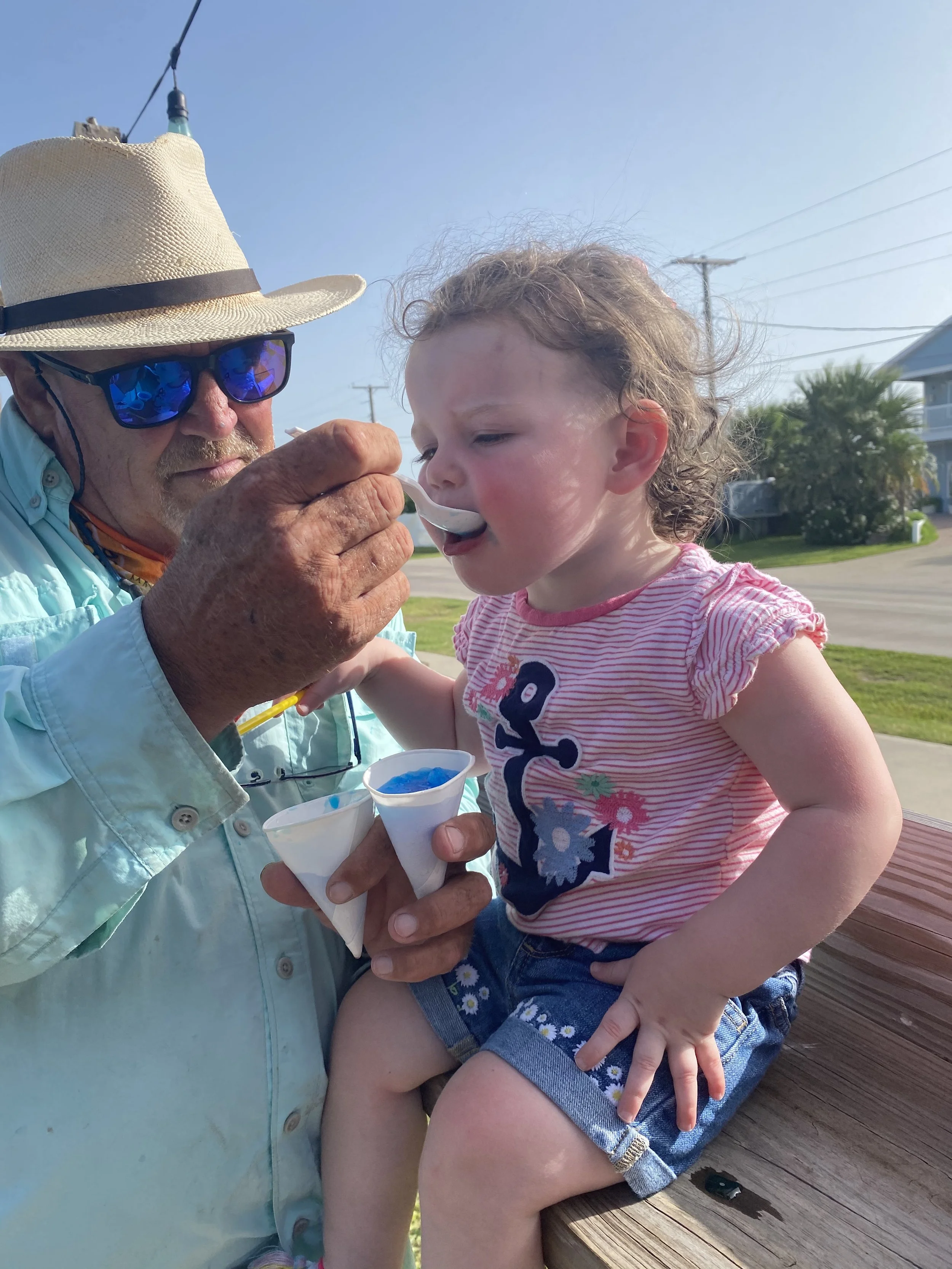 Guests enjoying shaved ice at Duck Blind Fulton Harbor location