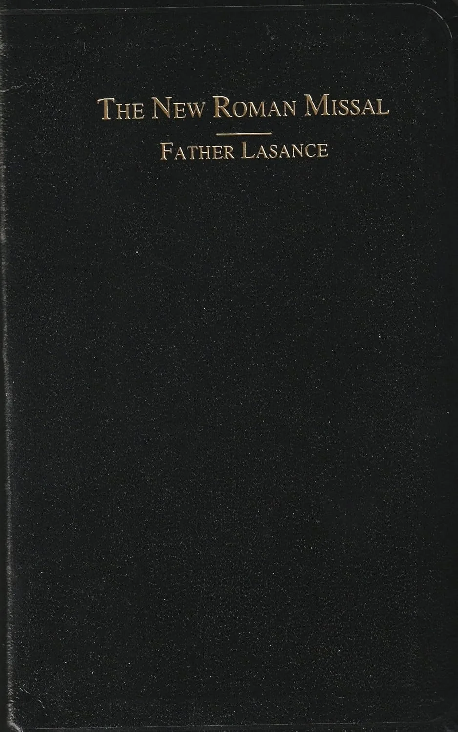 Black cover of a religious book titled 'The New Roman Missal' by Father Lasance, with gold lettering.