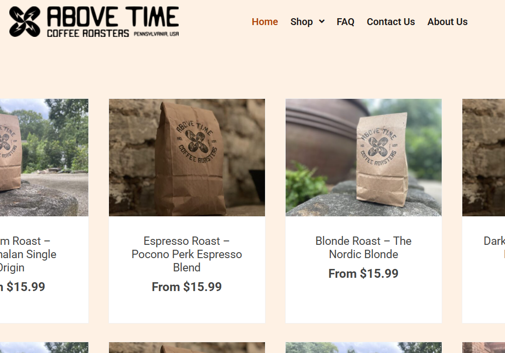 A website homepage for Above Time Coffee Roasters, Pennsylvania, USA, displaying images of coffee bags and pricing for different coffee blends.