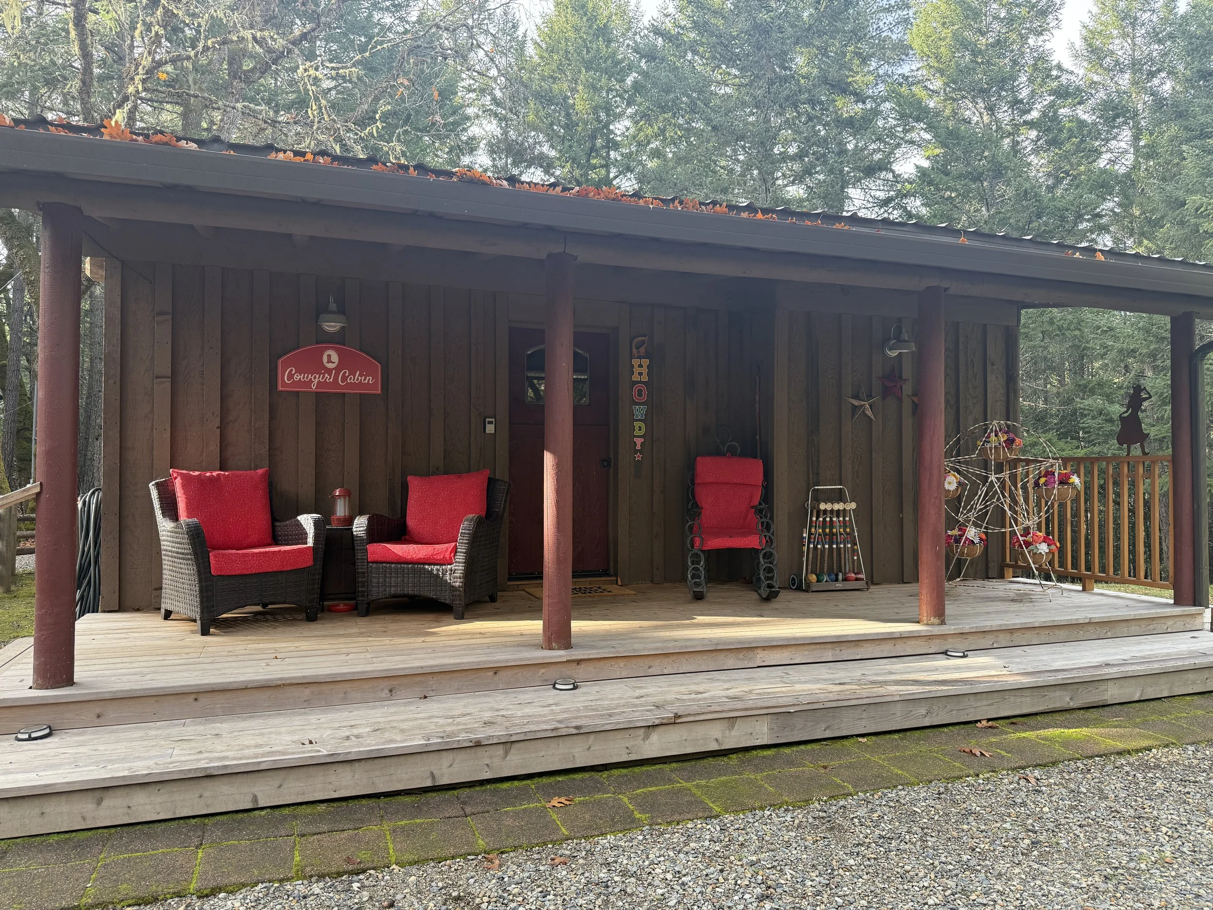 Forest Cabin Front Porch With Comfortable Chairs
