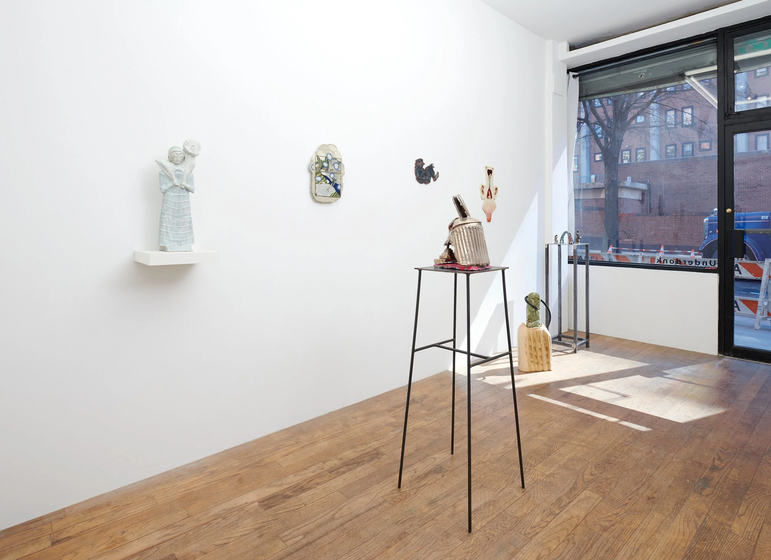  An installation view of several wall works and floor sculpture from the exhibition, 'Ancient Modern'.&nbsp; 