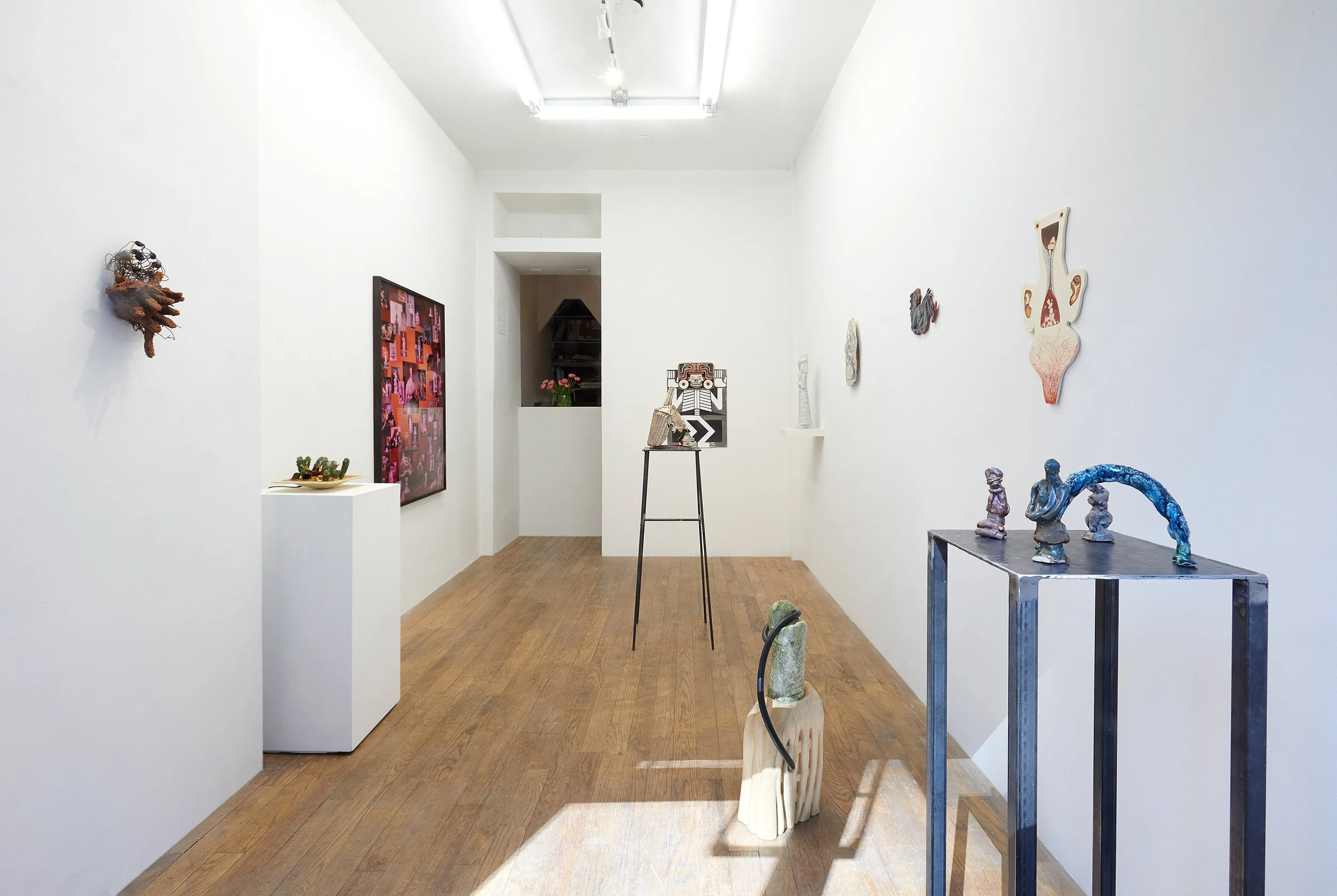 An installation view of several wall works and floor sculpture from the exhibition, 'Ancient Modern'.&nbsp; 