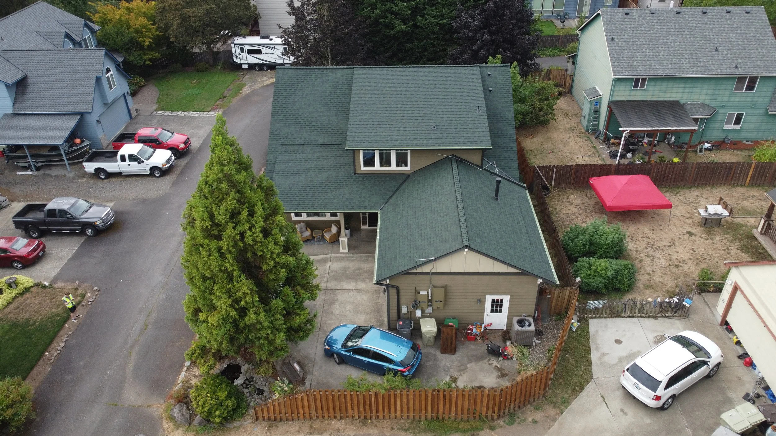 Aerial view of a a GAF Hunter Green Roof installation in Hillsboro, Oregon by AE&I Roofing and Construction