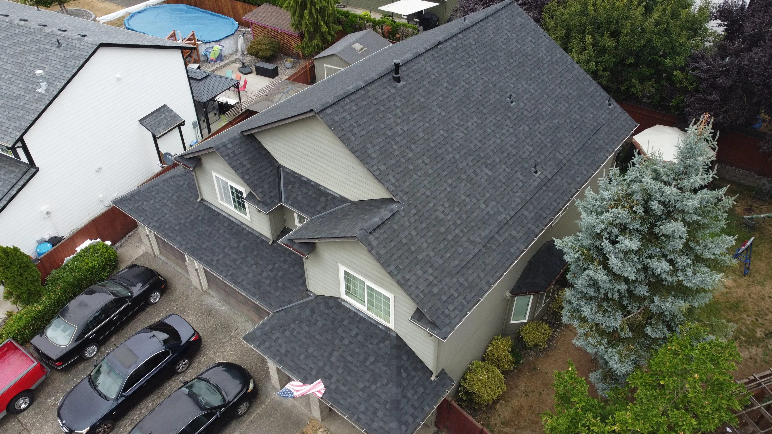 An aerial view of a residential roof replacement by AE&I Roofing and Construction