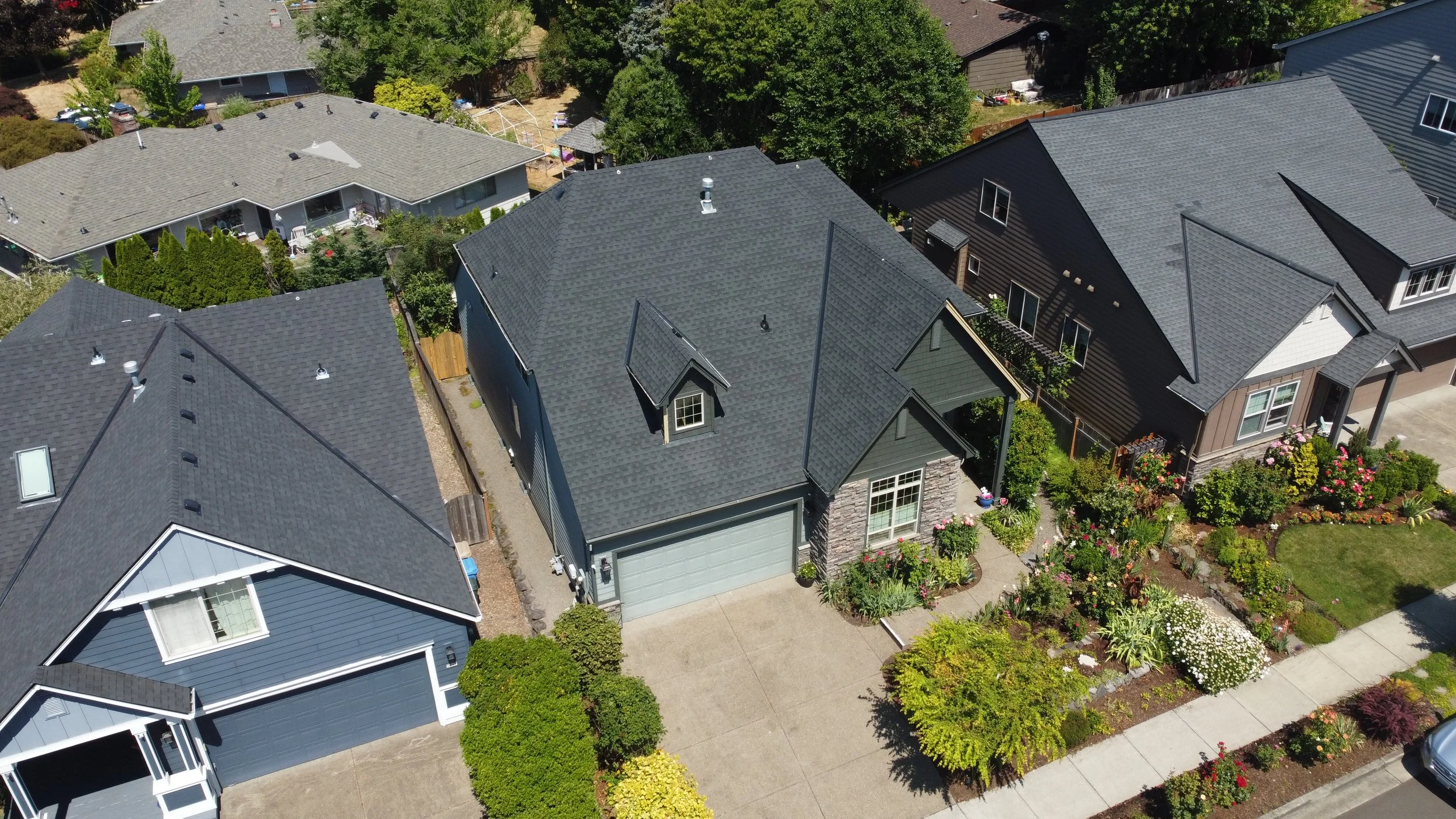 Aerial view of a roof replacement by AE&I Roofing and Construction