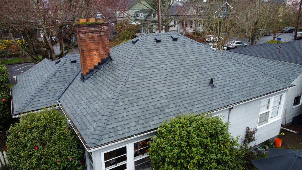 An aerial view of a new roof replacement by AE&I Roofing and Construction
