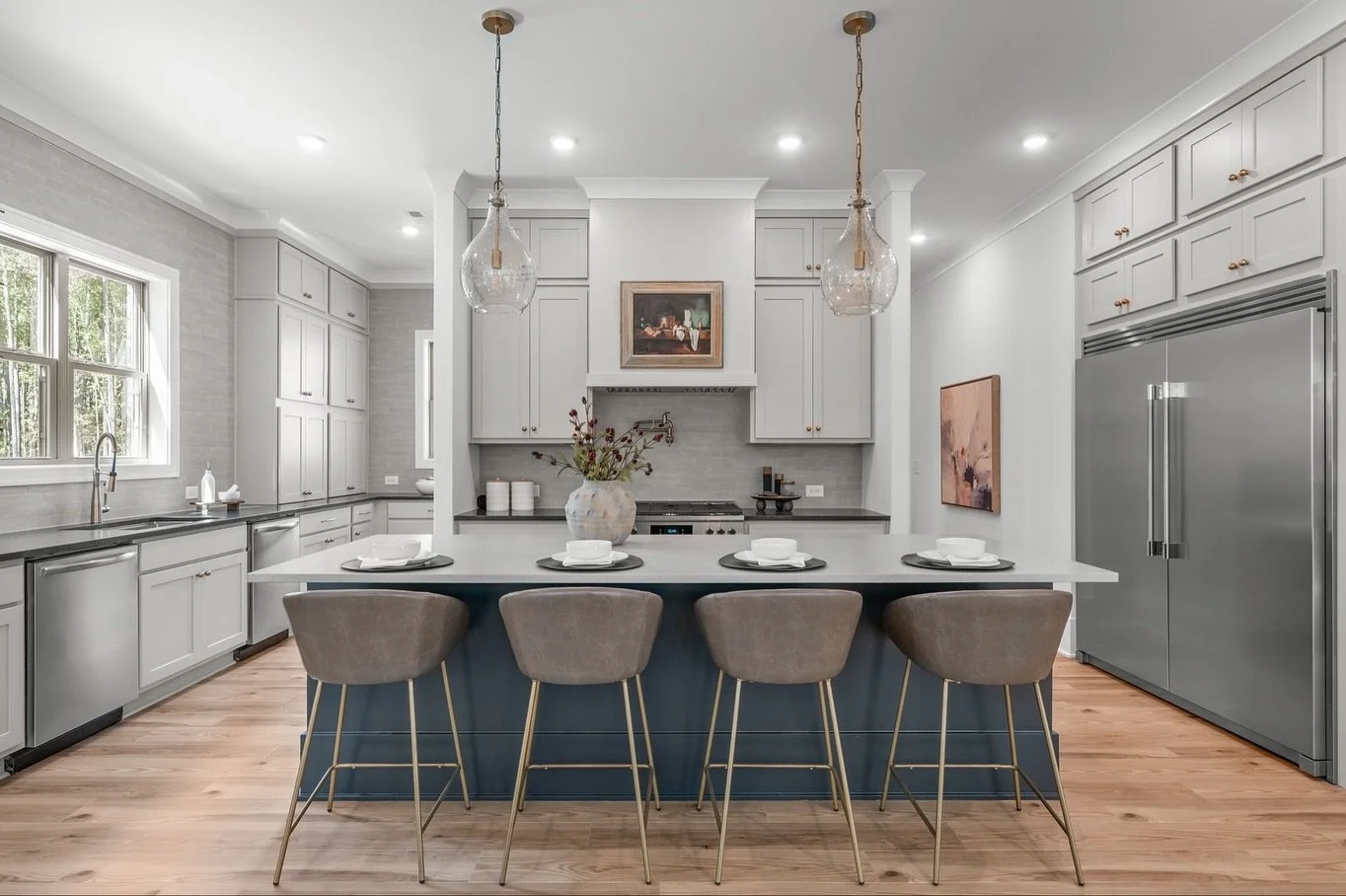 Holiday hosting hits different when your kitchen is built for it. 🤝

Think oversized islands for grazing boards, smart layouts for seamless flow and storage that keeps the chaos tucked away. 👋

With sculleries to hide the prep-work and designer din