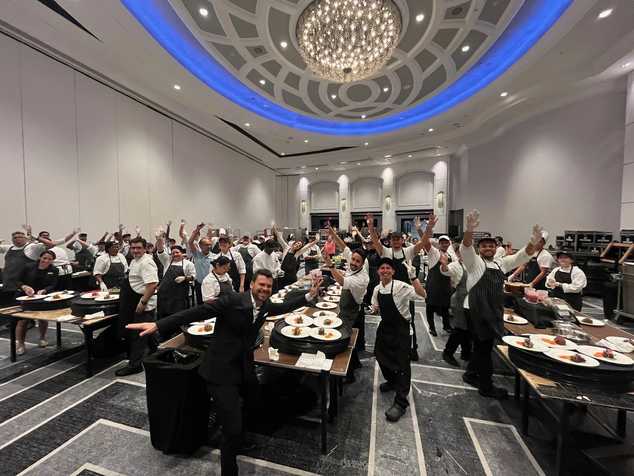 The kitchen staff hard at work prepares for SOBEWFF 2025 dinner