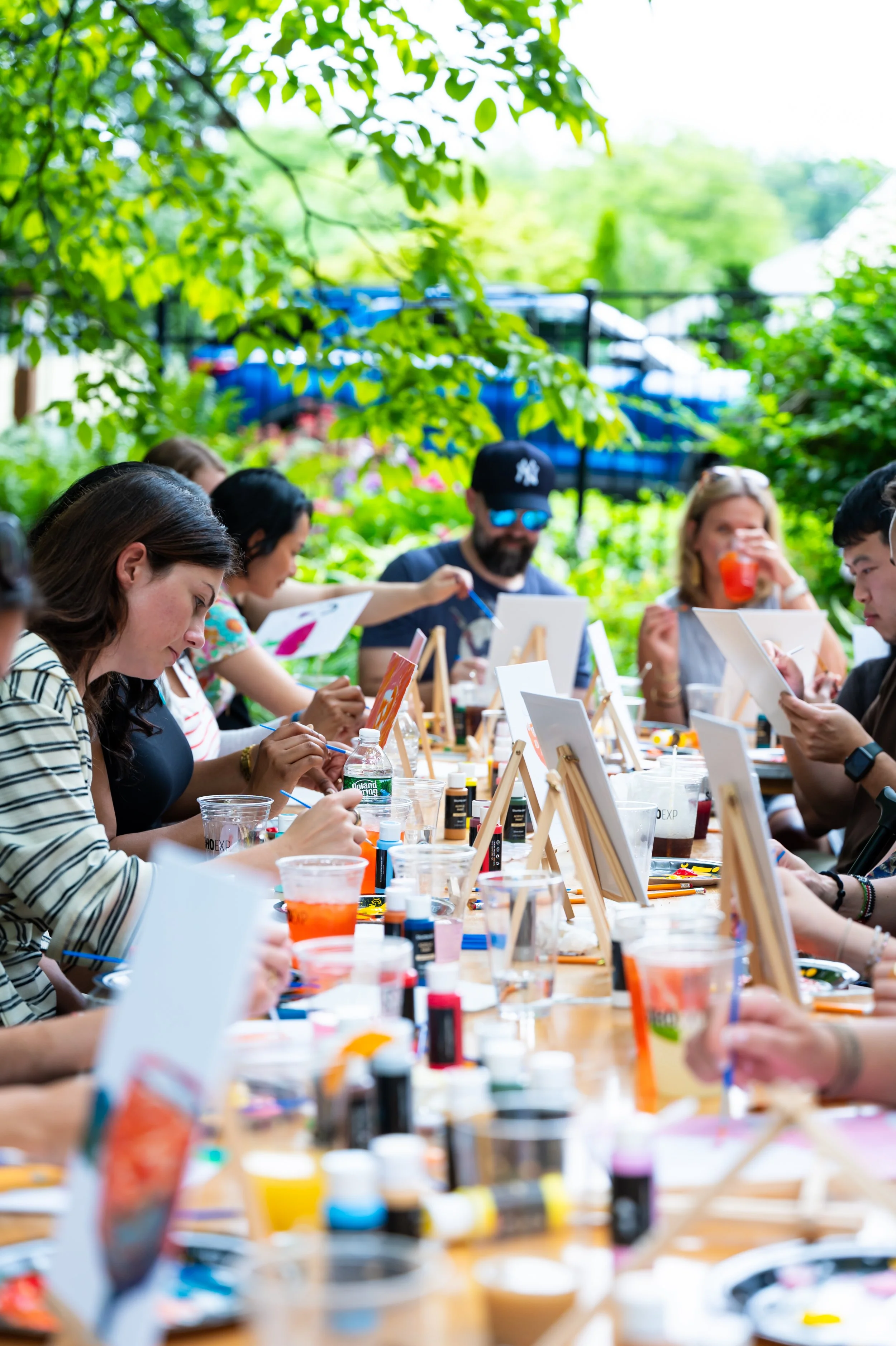 People gathering and painting