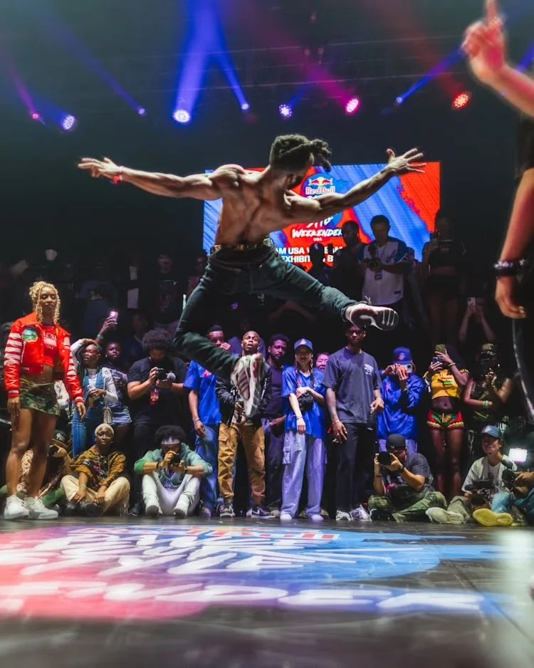 Dancer jumps in the air during his performance